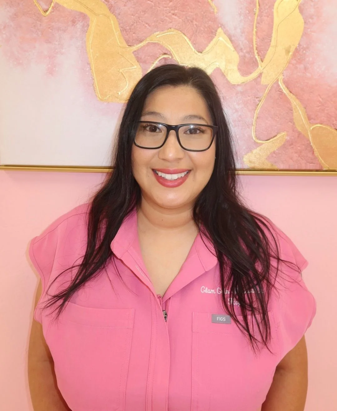 Aesthetic specialist preparing medical-grade treatment equipment